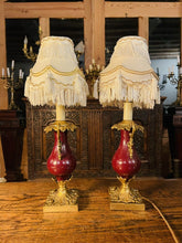 Load image into Gallery viewer, Pair Of Antique 19th Century Bronze &amp; Red Enamel Urn Lamps
